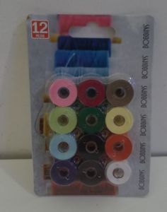 Carreteles altos plásticos con hilos de colores x 12